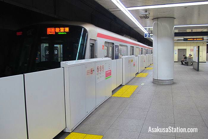 A train departing at Platform 2 TX Asakusa Station