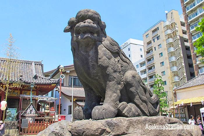 The komainu statue on the right of the path has an open mouth