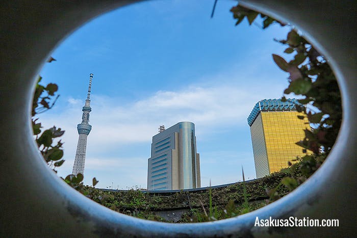 A view through the artwork of the Tokyo skyline