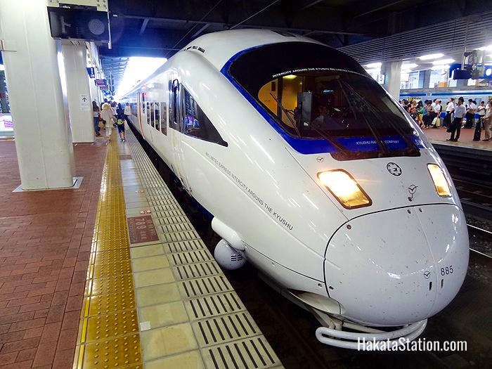 A Kamome limited express train bound for Nagasaki stops at Hakata Station