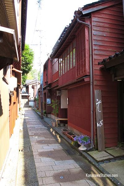 Kanazawa Sushi can be found in a red building down a narrow alleyway