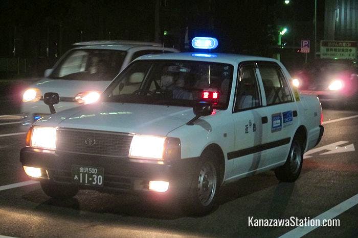 An available Kintetsu taxi at night