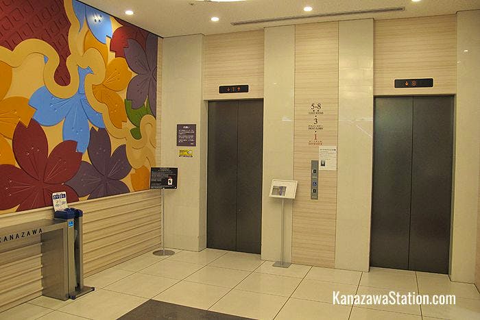 The hotel elevators at the 1st floor entrance