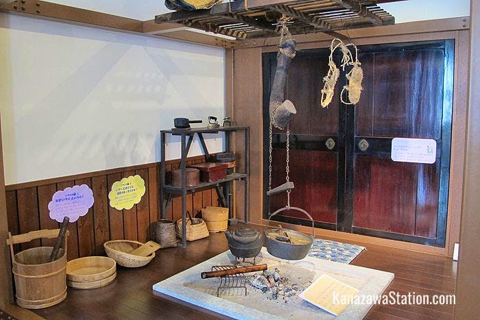 A reconstructed farmhouse hearth with objects children can pick up and handle