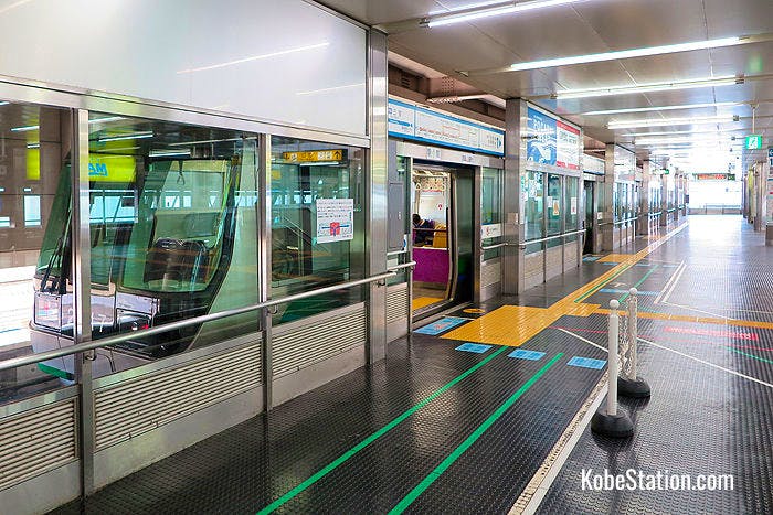 Port Liner platforms feature safety gates that open only when the train has arrived