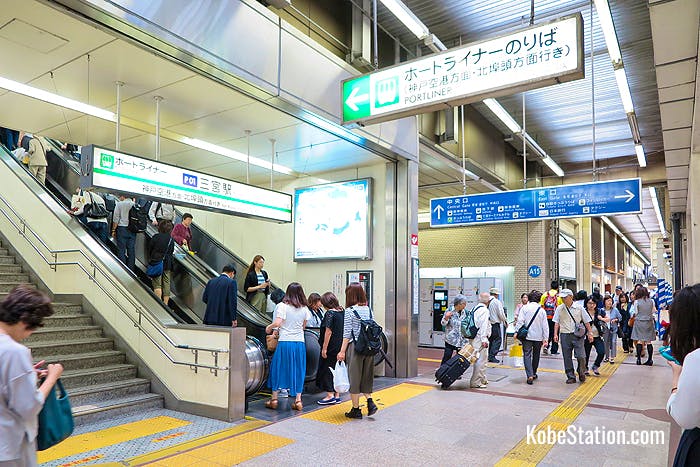 The stairs and escalator leading to Port Liner Sannomiya Station