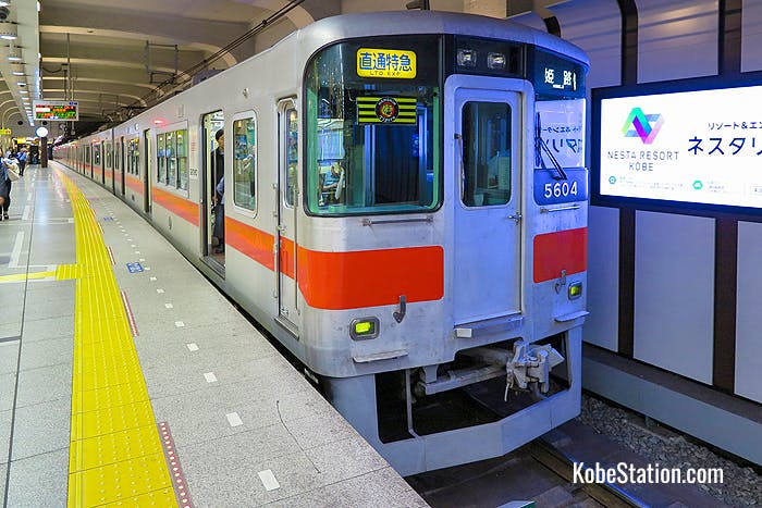 A Sanyo Dentetsu limited express bound for Himeji at Platform 3