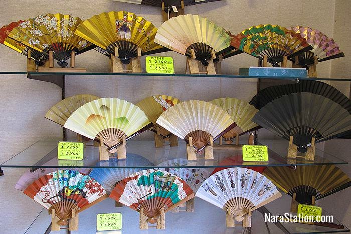 A colorful display of folding fans at Ikeda Gankodo