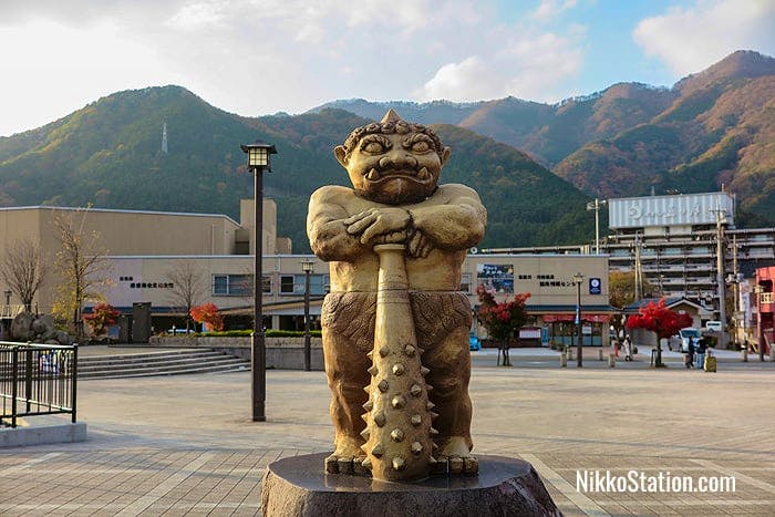 A statue of the demon Kinuta, Kinugawa Onsen’s mascot, stands outside the station exit