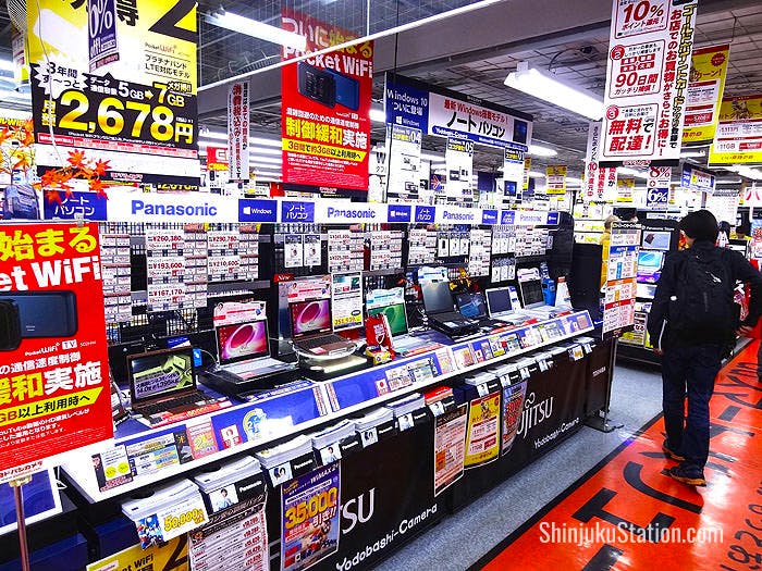 Yodobashi Camera’s interior is festooned with advertising and logos
