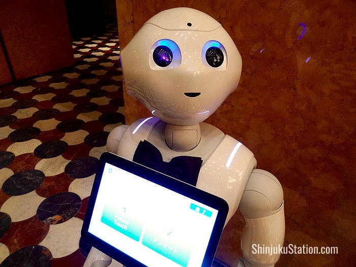 SoftBank’s humanoid robot Pepper stands near the front desk
