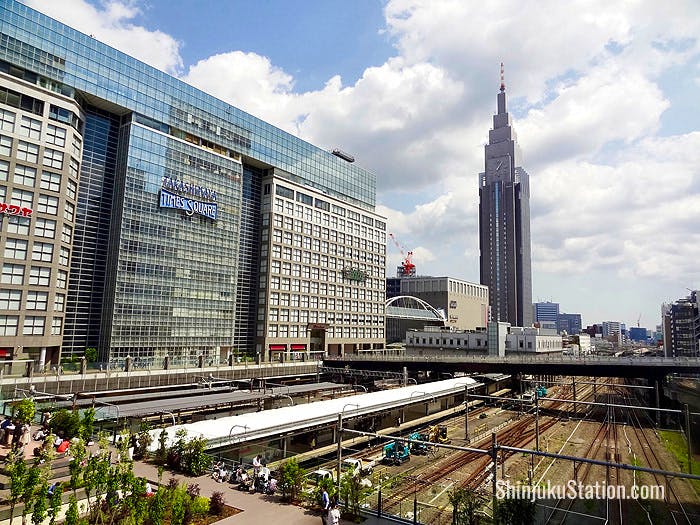 The view of the Shinjuku Southern Terrace shopping area and the NTT DoCoMo Yoyogi Tower from the New South Exit plaza