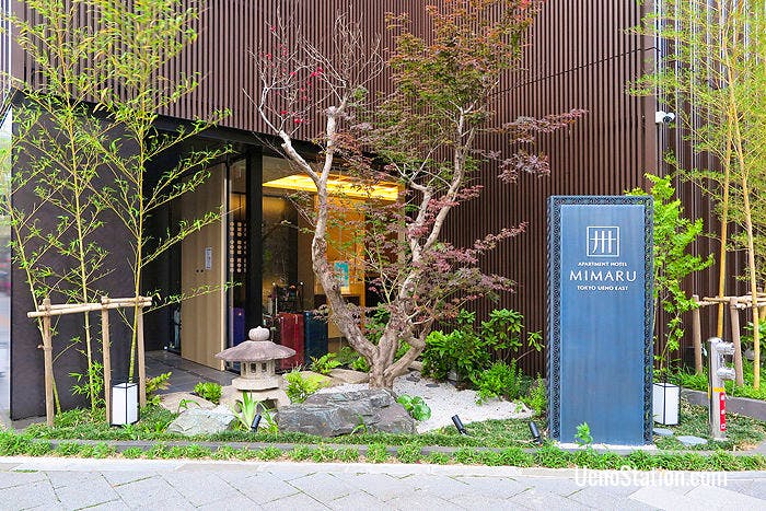 The hotel’s side entrance and garden