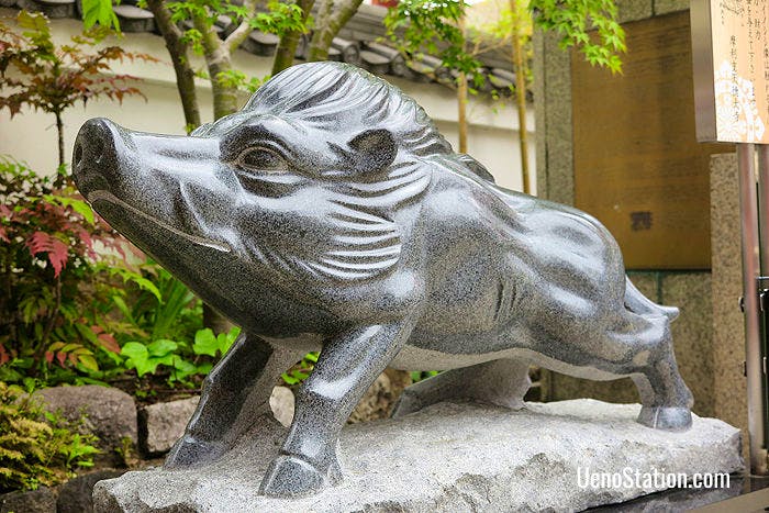 A statue of a wild boar